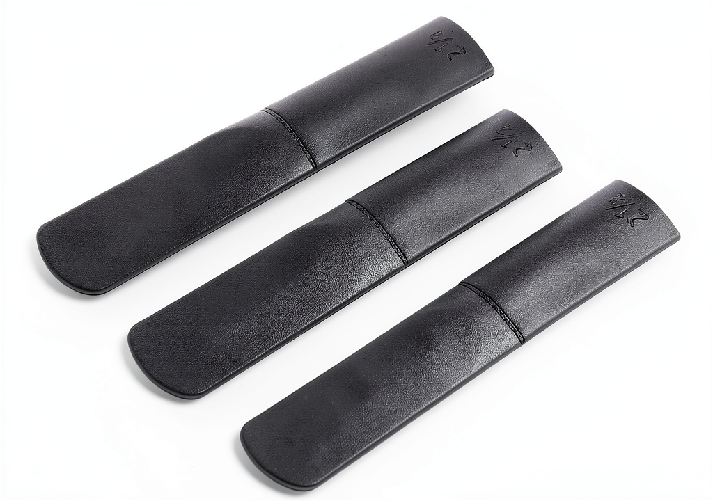 Installing VGEBY Alto Saxophone Reeds Resin Easy to Use on a wooden desk
